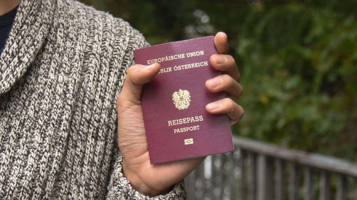 https://dazzlingdawn.com/wp-content/uploads/2023/09/Austria-passport.jpg