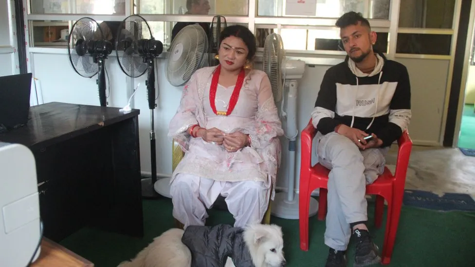 https://dazzlingdawn.com/wp-content/uploads/2023/11/Surendra-Pandey-and-Maya-Gurung-prepare-to-register-their-marriage-at-the-Dordi-rural-municipality-office.webp