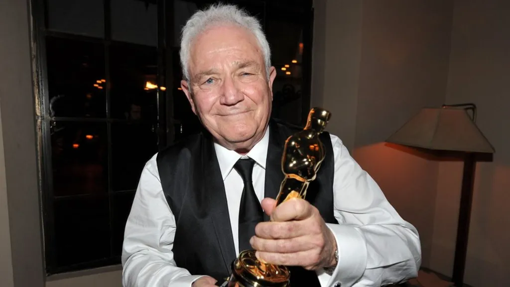 https://dazzlingdawn.com/wp-content/uploads/2024/03/David-Seidler-won-the-Oscar-for-Best-Original-Screenplay-for-The-Kings-Speech-in-2011.webp