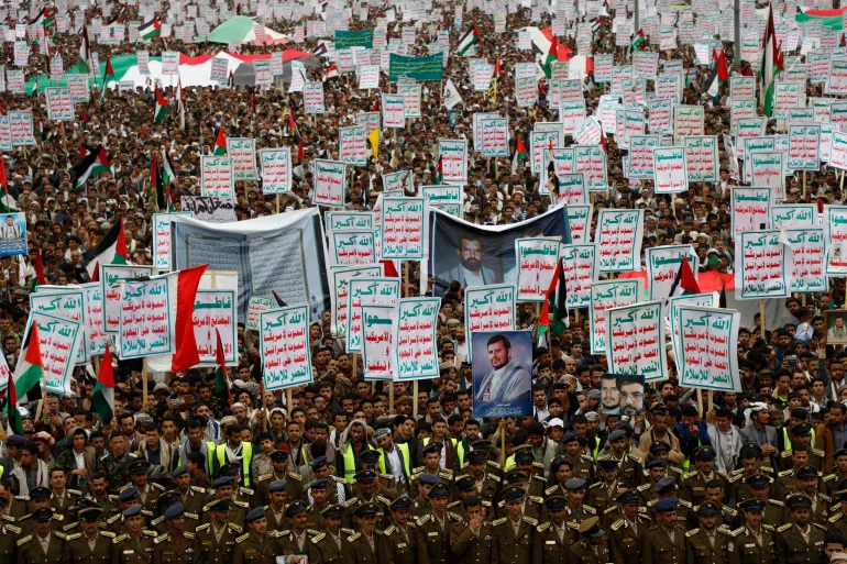 https://dazzlingdawn.com/wp-content/uploads/2024/03/Houthi-supporters-in-Sanaa-attend-a-rally-on-February-16-against-the-US-led-strikes-on-Yemen-and-in-support-of-Palestinians-in-the-Gaza-Strip.webp