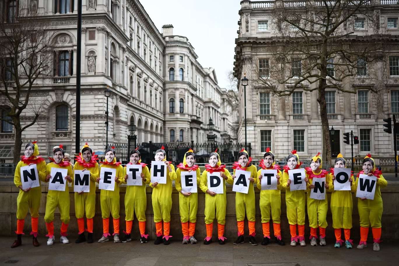 https://dazzlingdawn.com/wp-content/uploads/2024/03/Labour-activists-staged-a-protest-outside-Downing-Street-calling-for-the-prime-minister-to-name-the-date-for-a-general-election.jpg