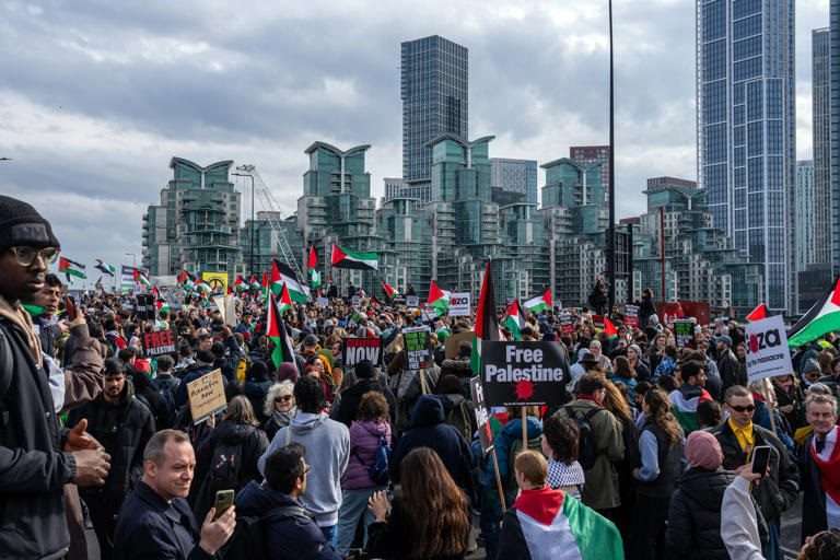 https://dazzlingdawn.com/wp-content/uploads/2024/03/Protesters-march-in-support-of-Gaza-Getty-Images.jpg